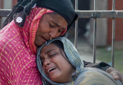 Assam women crying on arrest of family members